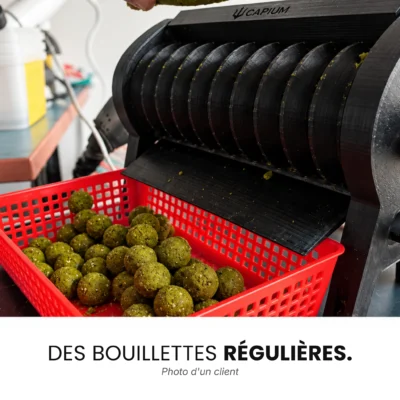 Homemade green boilies made with the Capium machine and retrieved from a red basket, customer's photo.
