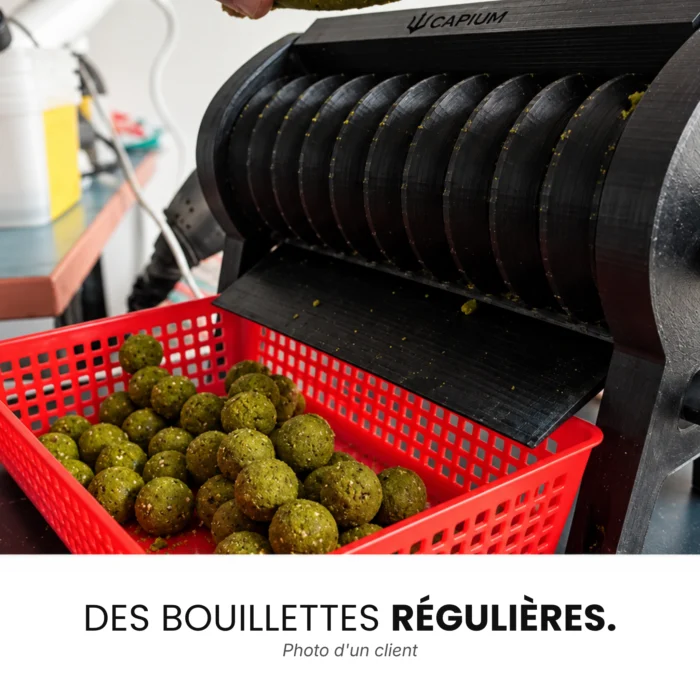Homemade green boilies made with the Capium machine and retrieved from a red basket, customer's photo.